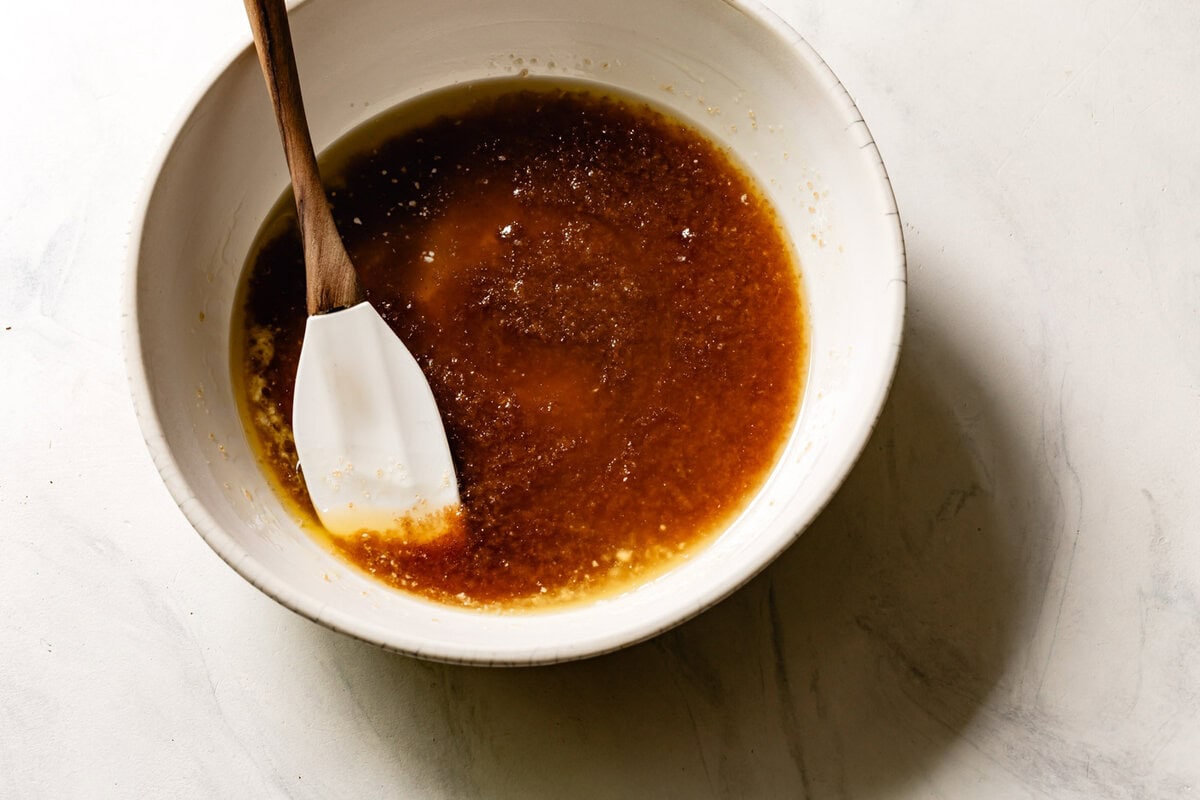 melted butter and sugars in a bowl